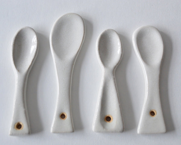 Condiment spoon I ~ far left